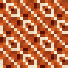 Abstract geometric seamless pattern in orange and brown color tones, vector illustration with texture