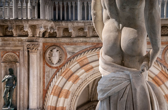 Sculpture details of classic male form. Venice, Italy