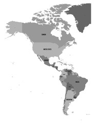 Political map of Americas in four shades of grey on white background. North and South America with country labels. Simple flat vector illustration.