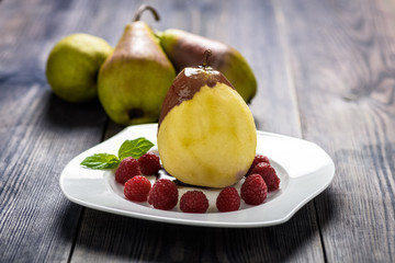 homemade dessert - pear with raspberries