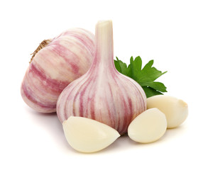Garlic with leaves of parsley isolated on white © oleh11