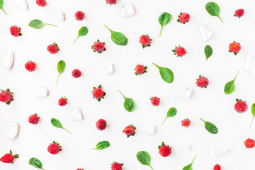 Fresh strawberry and coconut on white background. Fruit pattern. Summer concept. Flat lay, top view