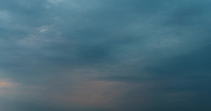 Time lapse clip with evening clouds before storm