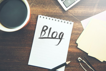 blog text on paper with stationary