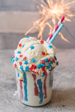 Vanilla funfetti milkshake with ice cream. Patriotic drink cocktail