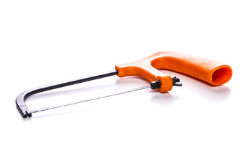 Photo of orange hacksaw close-up