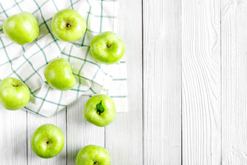 Fototapeta na wymiar summer food with green apples on white background top view mock up