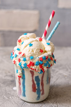 Vanilla funfetti milkshake with ice cream. Patriotic drink cocktail