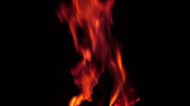 The flame of the fire at night. Slow motion