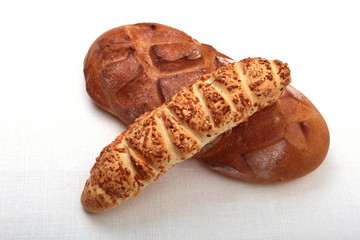 Assorted Fresh homemade bread on white background. Selective focus