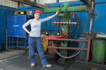 Fototapeta premium female mechanic in factory