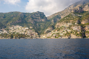 Positano in afternoon sun seen from the sea