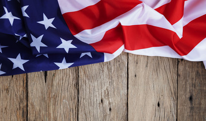 American flag on wood background for Memorial Day or 4th of July.