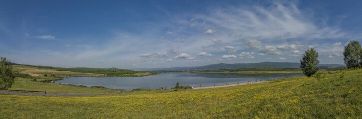 Yellow meadow near Milada lake