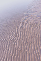 Texture of sand wave, lighting from sunset