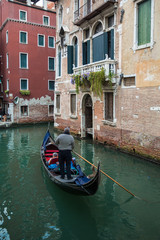 Fototapeta na wymiar Classic Gondola ride in Venice