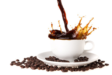 Pouring coffee into coffee cup with splashing., Isolated on white background.