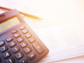 Business, finance, savings, banking or  loan concept : Pencil, calculator and savings account...