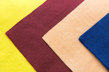 colourful tissue paper or napkin decorated on the table at dinner party. background and texture.