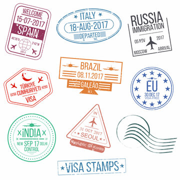Set of visa passport stamps. International arrivals sign rubber stamps.