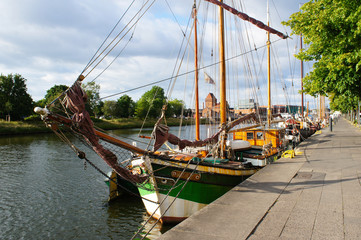 Old vessels or ships at the quay in Lubeck, Germany