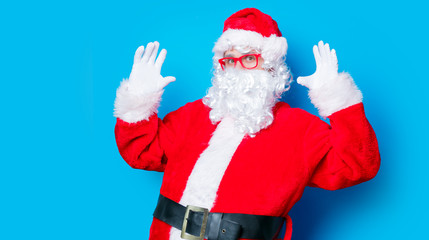 Funny Santa Claus have a fun with red eyeglasses