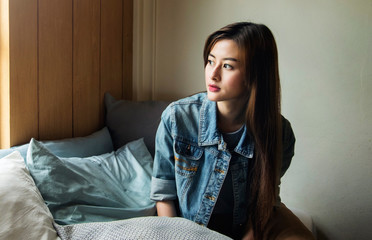 Beautiful asian woman at home