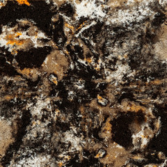 Close up of abstract artificial rock texture. Imitation brown quartz.