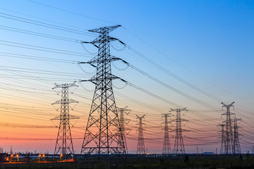 high voltage post,High voltage tower sky sunset background