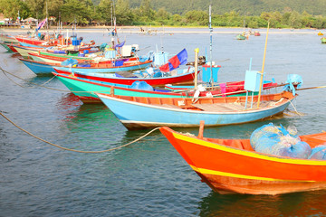Naklejka na ściany i meble Small fishing boats at fisherman village