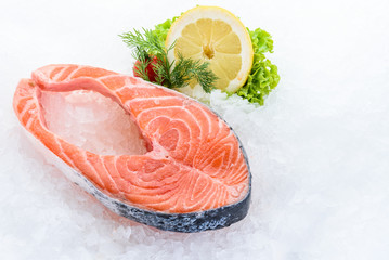 Fresh raw salmon fillet on  ice