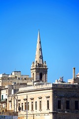 Fototapeta na wymiar View of St Pauls Anglican Cathedral spire, Valletta, Malta.