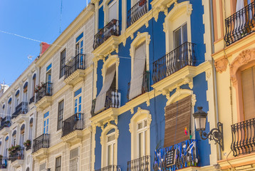 Fototapeta na wymiar Colorful apartment buildings in Russafa neighbourhood of Valencia