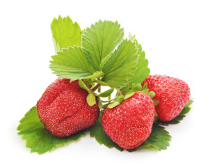 Ripe strawberry with leaves.