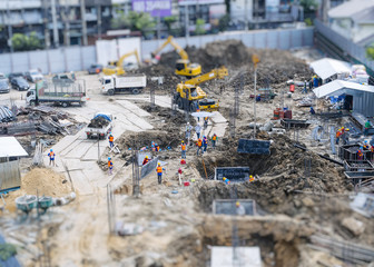 Construction site outdoor with Crane and People working