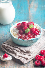 Fresh homemade cottage cheese with raspberries