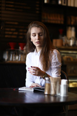 The girl in the cafe breakfast