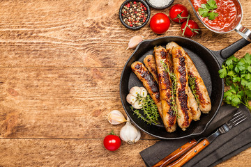 Grilled sausages with sauce