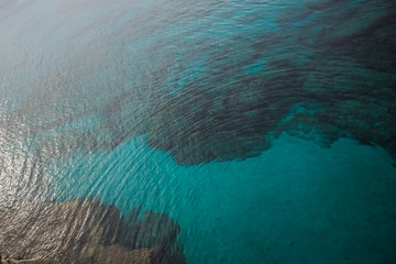 Fototapeta na wymiar Sea bay with azure water near Protaras, Cyprus island.