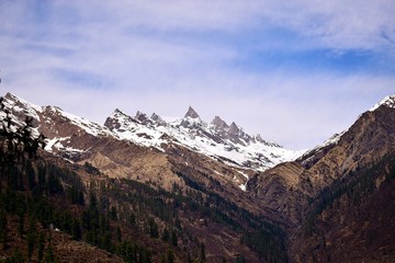 Fototapeta na wymiar Snowy covering mountains