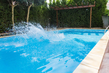 Splashing water in pool