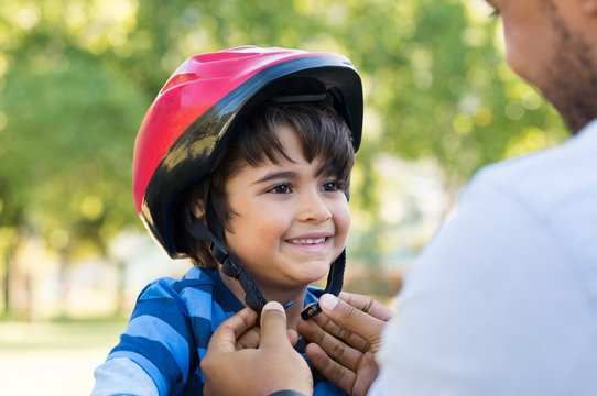 Boy wearing cycle helmet