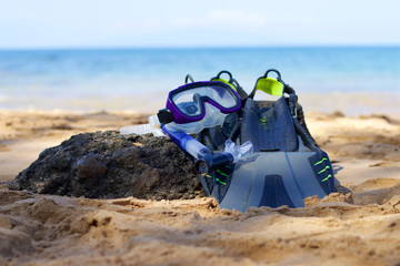 Snorkeling equipment lying on a beach