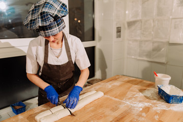 Cutting roulade. Making Poppy Seed Snail