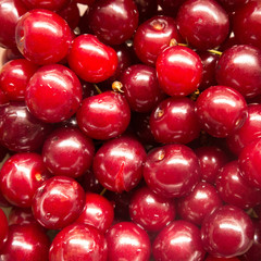 Ripe red cherry berries background pattern