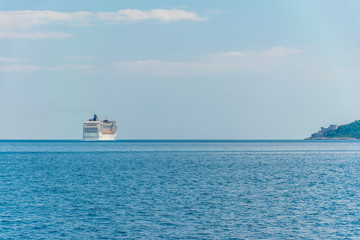 A huge liner with tourists went to the open sea.