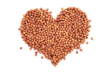 Dried black chickpeas in a heart shape