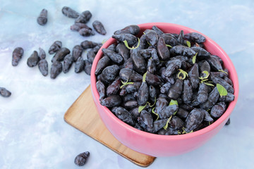 Summer still life with ripe honeysuckle