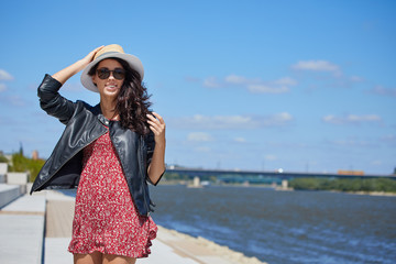 Beautiful Woman to Go in the City. Toned Photo with Copy Space.