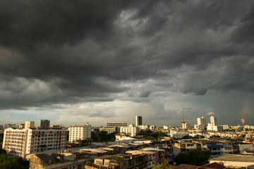 storm cloud in the sky above the city